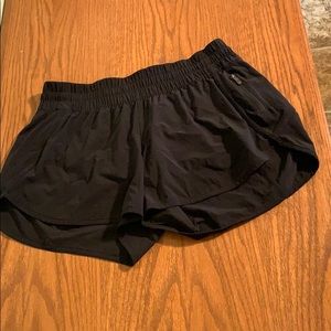 Black lululemon tracker V shorts 4in inseam size12